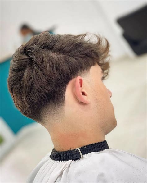 taper cheveux ondulés|La coiffure Taper : Une coupe homme qui a la classe